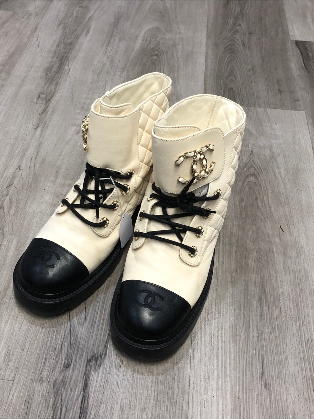 CHANEL Ivory Quilted Leather Lace-Up Ankle Boots with Black Cap Toe